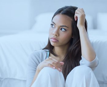 woman sitting alone