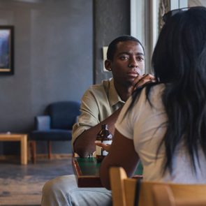 Two people having discussion in cafe