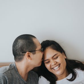 affectionate couple at home together