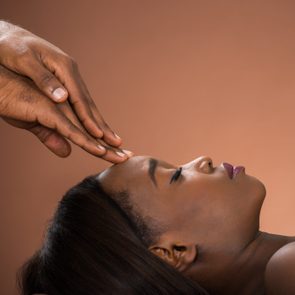 Woman Receiving Forehead Massage